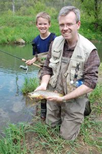 father and son trout fishing in the driftless