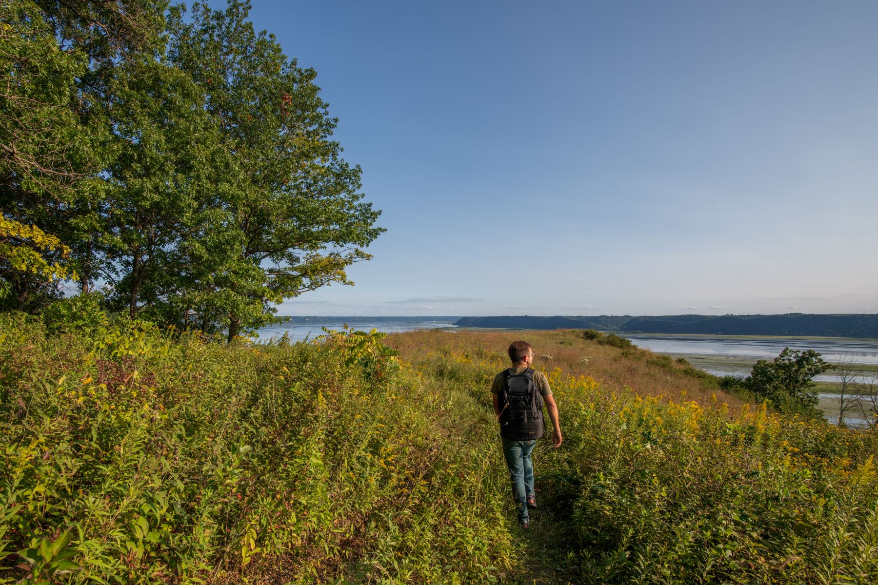 Man hiking a bluff top