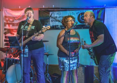 A group sings on stage