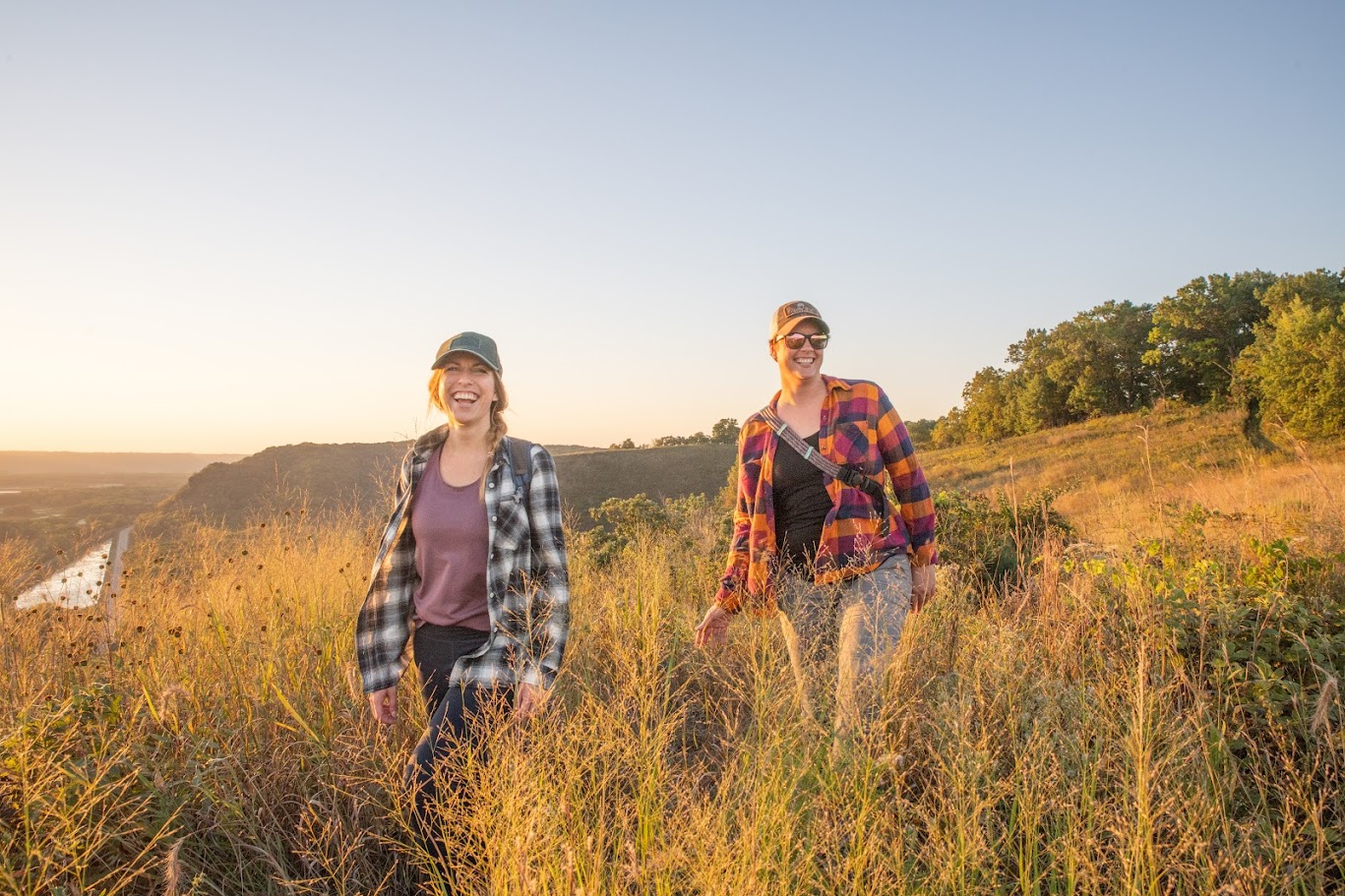 Two walk through a bluff's goat prairie