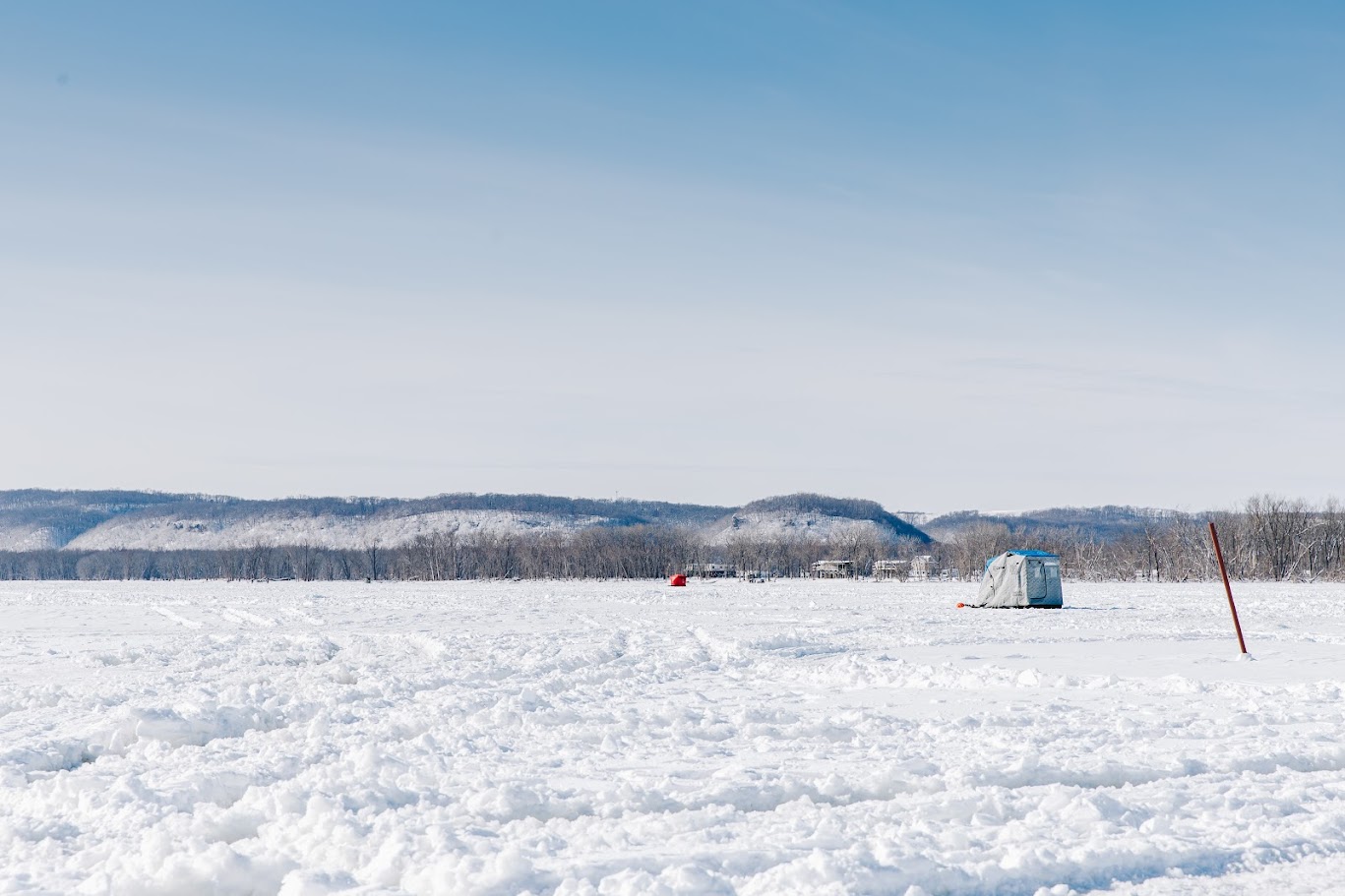 Lone icefisherman on the mississippi backwaters